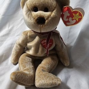 Ty Signature beanie babie.he is retired and stored from personal collection